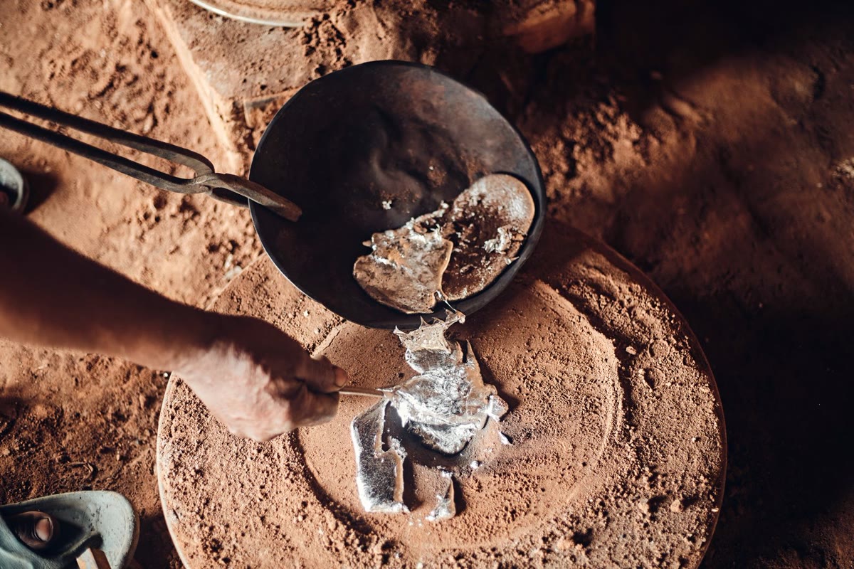 A freshly cast silver tree after the investment is washed away